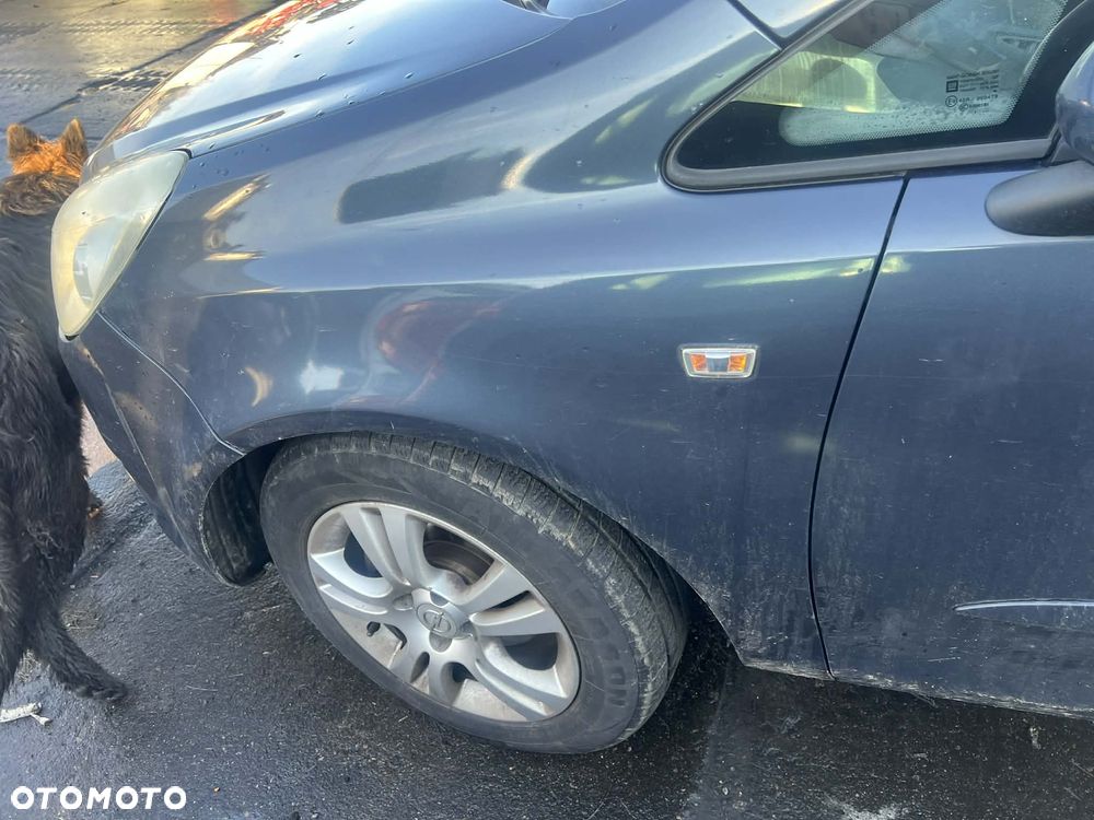 Błotnik lewy / prawy Opel Corsa D !! BRAK KODU LAKIERU !! Cena za szt.