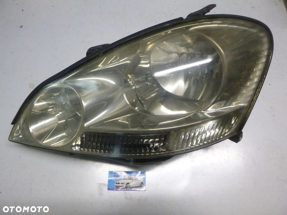 LAMPA LEWY PRZÓD TOYOTA AVENSIS VERSO 2003r - 2