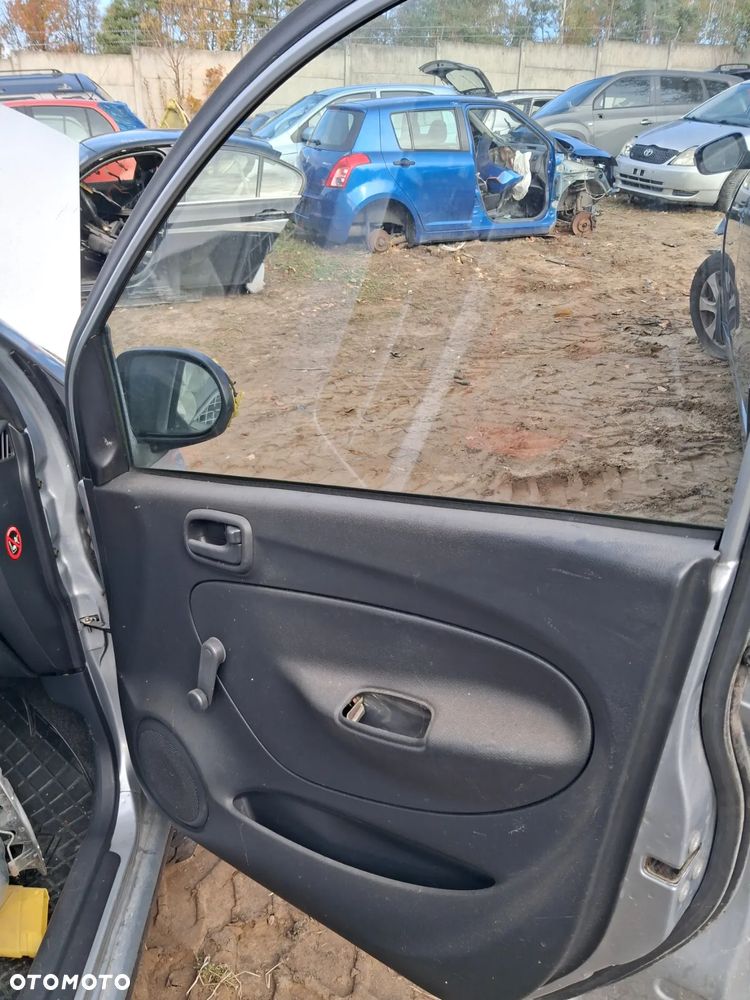 Daihatsu cuore 03 drzwi prawy przod E28 - 5