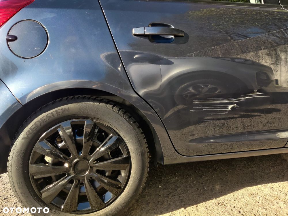 Opel Corsa 1.2 16V Enjoy - 22