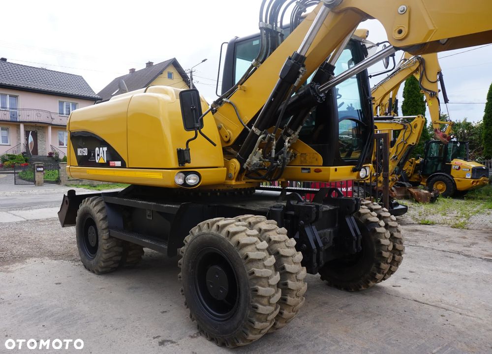 Caterpillar CAT M 315 D - 4