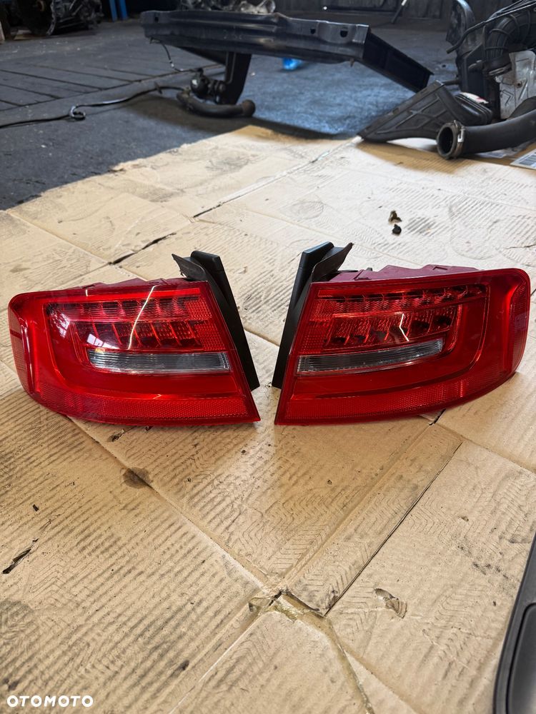 Audi a4b8  Moduł sterownik drzwi lewy przód 8T0959793 - 100 złoty  Panel klimatyzacji 8K1820043AG - 150 złoty  Silniczek wycieraczek 8K1955119A - 100 złoty  Panel sterowania 8K0864261 - 100 złoty  Panel przycisk ESP 8K0959673 - 100 złoty  Wyświetlacz Navi 8T0919603G - 100 złoty  Moduł sterowania gateway - 100 złoty  Moduł komfortu 8K0907063DH - 200 złoty  Moduł sterownika hamulca ręcznego 8K0907801L - 100 złoty  Komputer sterownika silnika 0281018576 - 100 złoty  Włącznik przełącznik świateł 8K0941531AR - 100 złoty  Radio 8R1035186F - 200 złoty  Licznik obrotomierz 8K0920901G - 200 złoty pęknięty  Moduł sterownik komfortu 8K0907064GD - 150 złoty  Pompa sterownik abs 8K0907379CH - 250 złoty  Audi a4b8 lift 8K5945096AC - 500 złoty                          8K5945095AC - 500 złoty  Strefa zgniotu lewa prawa 8K0607133D - 100 złoty                                                8K0807134D- 100 złoty  Kierownicą powietrza 8K0129739A - 100 złoty   Obudowa filtra powietrza 8K0133837BF - 150 złoty  Hak a4b8 - 250 złoty  Belka zderzaka przód 8K0807113F - 250 złoty  Moduł sterownik wentylatora chłodnicy 8K0959501F - 200 złoty  Pas przedni wzmocnienie czołowe belka zderzaka  993329B - 800 złoty  Grill Audi a4b8 8K0853651E - 400 złoty  Czujnik ciśnienia 0281002977 - 100 złoty  Dwie rury węże od wody - 100 złoty za sztukę - 9