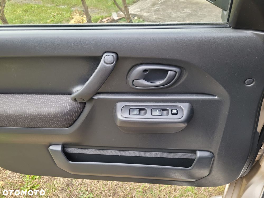 Suzuki Jimny 1.3 JLX / Comfort - 13
