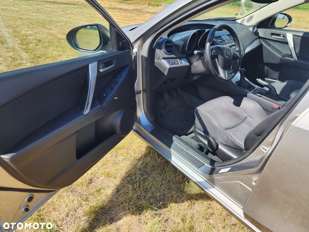 Mazda 3 2.0 Exclusive + - 9