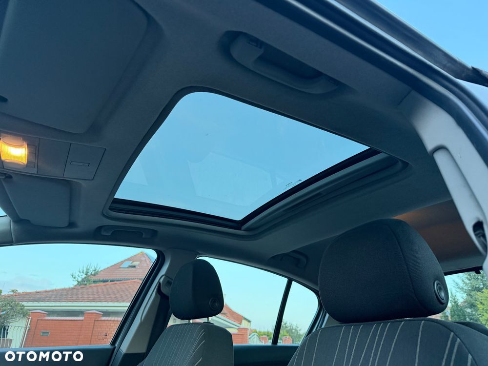 Opel Corsa 1.2 16V Cosmo - 10