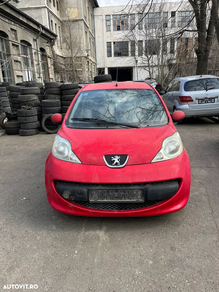 Dezmembrez Peugeot 107 rosu 2007 1.0 benzina 4usi - 7