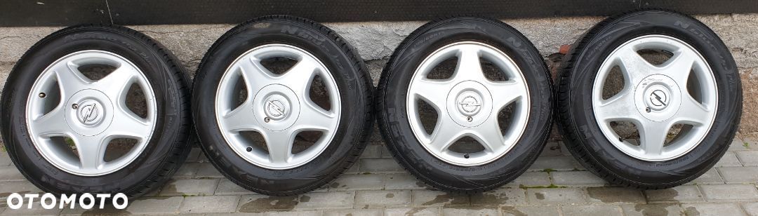 KOŁA OPEL CORSA ASTRA MERIVA ZAFIRA 4X100 ET49 OPONY NEXEN 195/60 R15 - 1