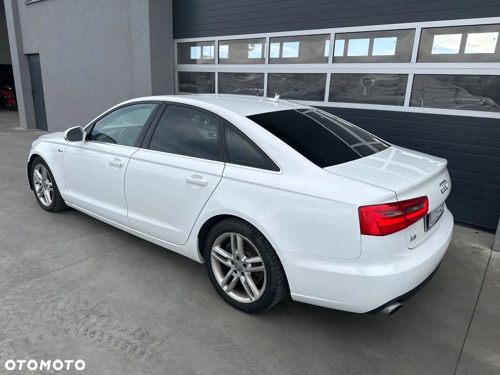 Audi A6 Avant 2012 photo 4