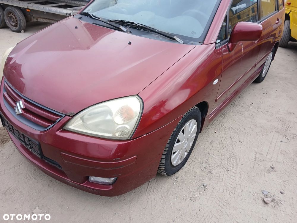 SUZUKI LIANA D31 fotel fotele kanapa deska kokpit podsufitka boczek boczki klamka podłokietnik - 1