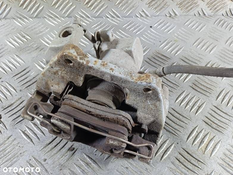 ZACISK LEWY TYLNY TOYOTA YARIS II - 2