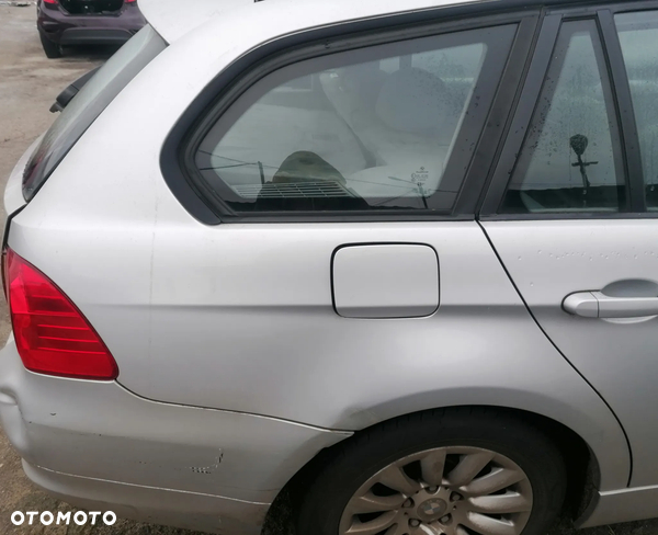 BMW SERII 3 E91 09r BŁOTNIK PRAWY TYŁ 354/7