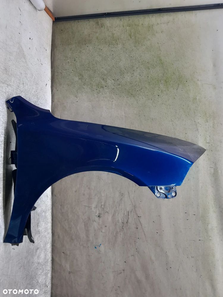 SKODA OCTAVIA II 2 BŁOTNIK PRZÓD PRZEDNI PRAWY 9463 NIEBIESKI - 1