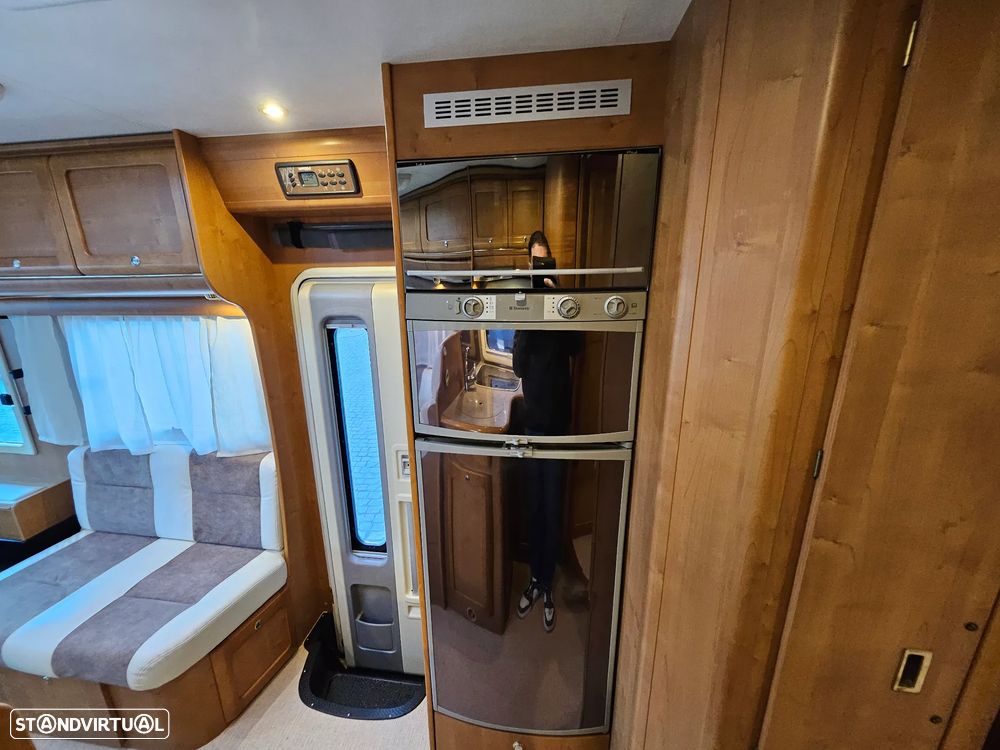 Rapido Le Randonneur 9097F CHASSI AL-KO Cama transversal + BASCULANTE - 27