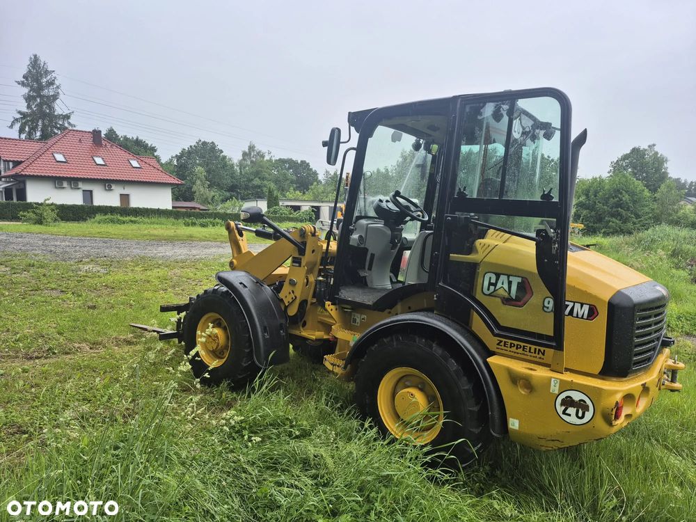 Caterpillar 907 - 11