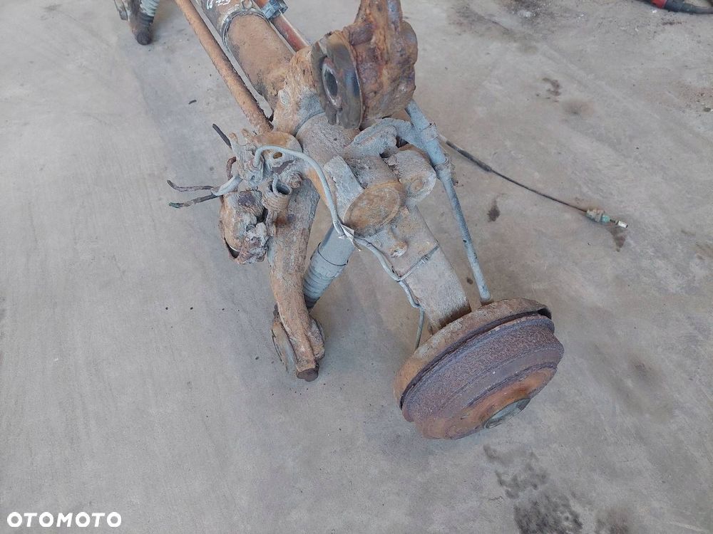 BELKA OŚ ZAWIESZENIA TYŁ BĘBNY BEZ ABS  PEUGEOT 206 I - 3
