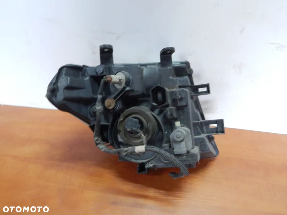 Lampa przód przednia Nissan Navara D40 Pahfinder R51 05-14 zwykła Łuków części - 4