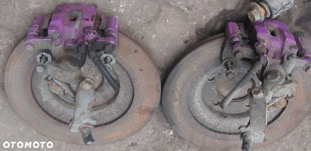 zacisk tył tarcze MAZDA RX8 MX5 - 2