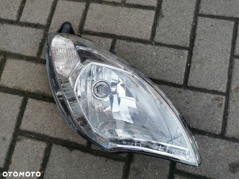 Reflektor Lampa przód Peugeot Satelis 125 14R - 1