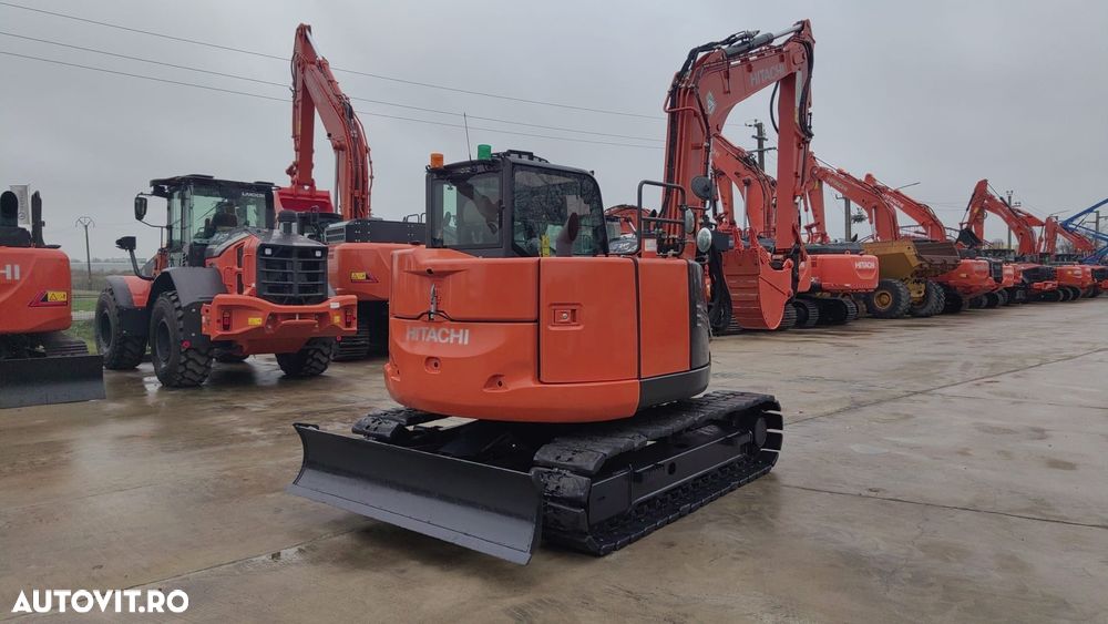 Hitachi ZX85, 2023, 2.314h, MASA OPERATIONALA 9,3tone, senile cauciuc pad, CUPLA RAPIDA HIDRAULICA si 3 cupe NOI, latime 2,2m, ad sapare 5m, inst picon pe brate, Aer cond, camera spate, posibil leasing 4 ani, CA NOU-PROMOTIE 63900 EUR+tva - 3