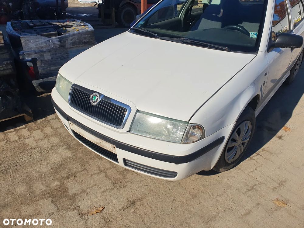 skoda octavia I lift fotel kanapa deska kokpit podsufitka boczek podłokietnik licznik panel szyb - 1