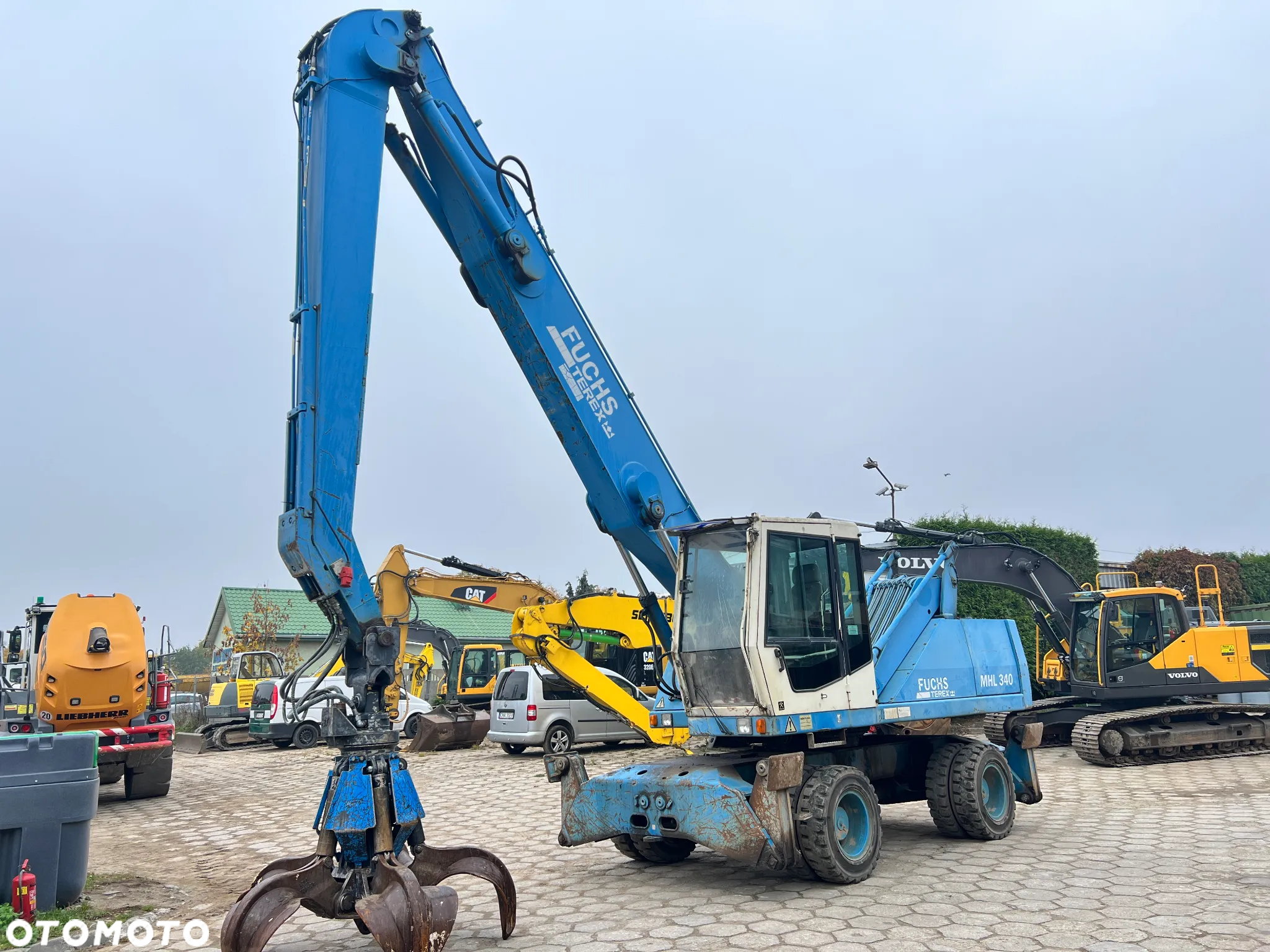 Fuchs MHL340 340 chwytak do złomu FUCHS 0,9m3 - 9