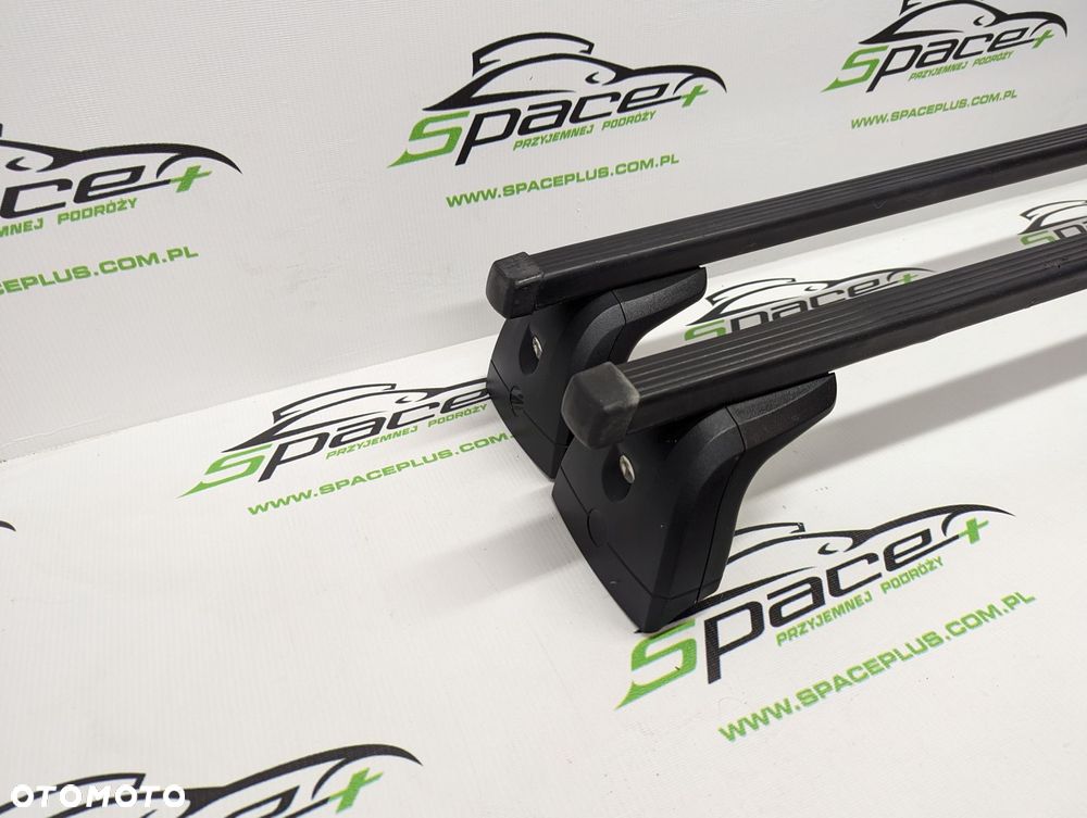 Bagażnik dachowy Thule: belki 761 + Kit dopasowujący 183084 + Stopy 751 - 2