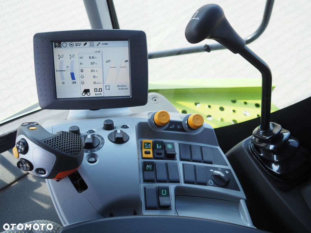 Claas Tucano 570 + V680 - 7