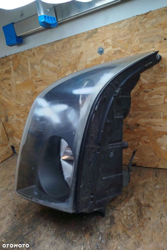 lampa przód lewa HELLA kompletna do lekkiej polerki do Vw Crafter I 06- 2E1941015, wszystkie uchwyty na miejscu - 4