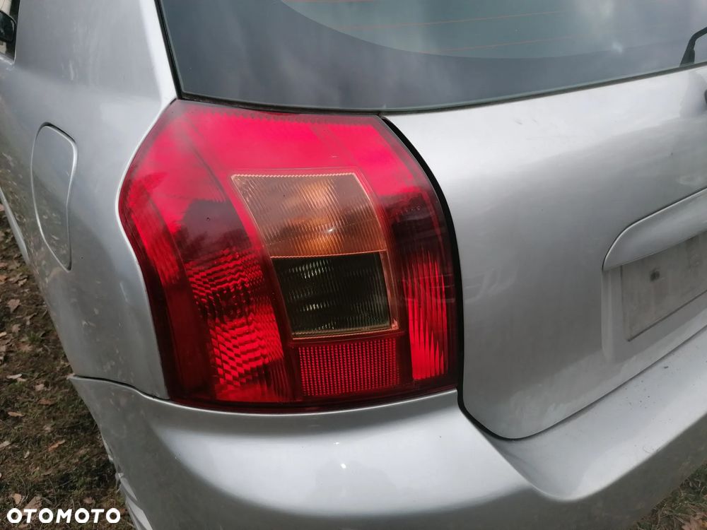 LAMPA LEWY TYL LEWA TYLNA COROLLA E12 HB - 1