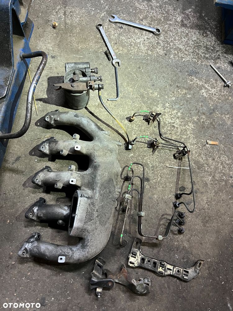 Kolektor ssący Mercedes 2.9td ssangyong korando - 2