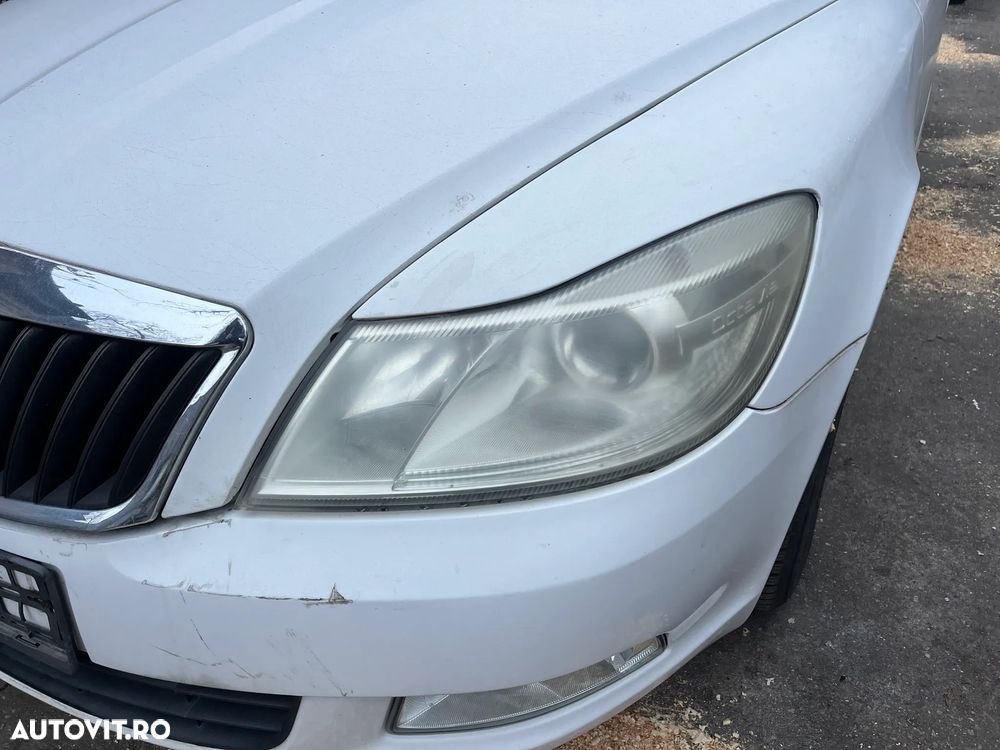 Far stanga cu lupa si halogen Skoda Octavia 2 facelift 2012 - 5