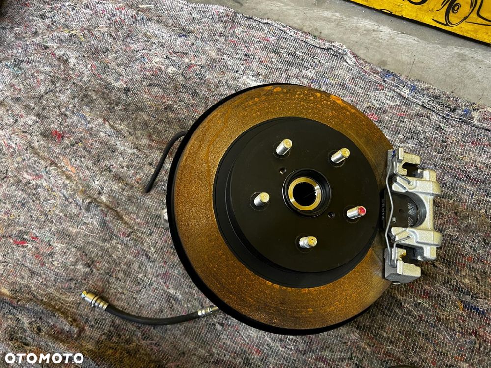 ZWROTNICA TARCZA ZACISK PIASTA TYŁ PRAWY SUBARU FORESTER VI SL 25- - 4