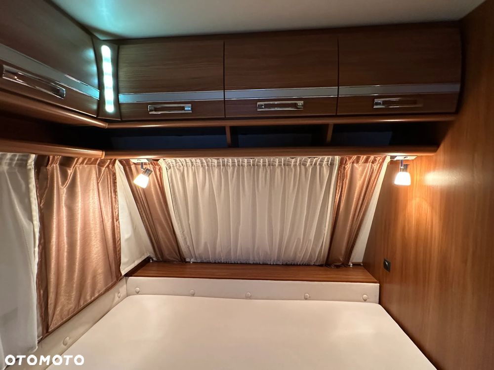 Dethleffs 550 NOMAD z przedsionkiem Isabella i łóżkami piętrowymi. - 34