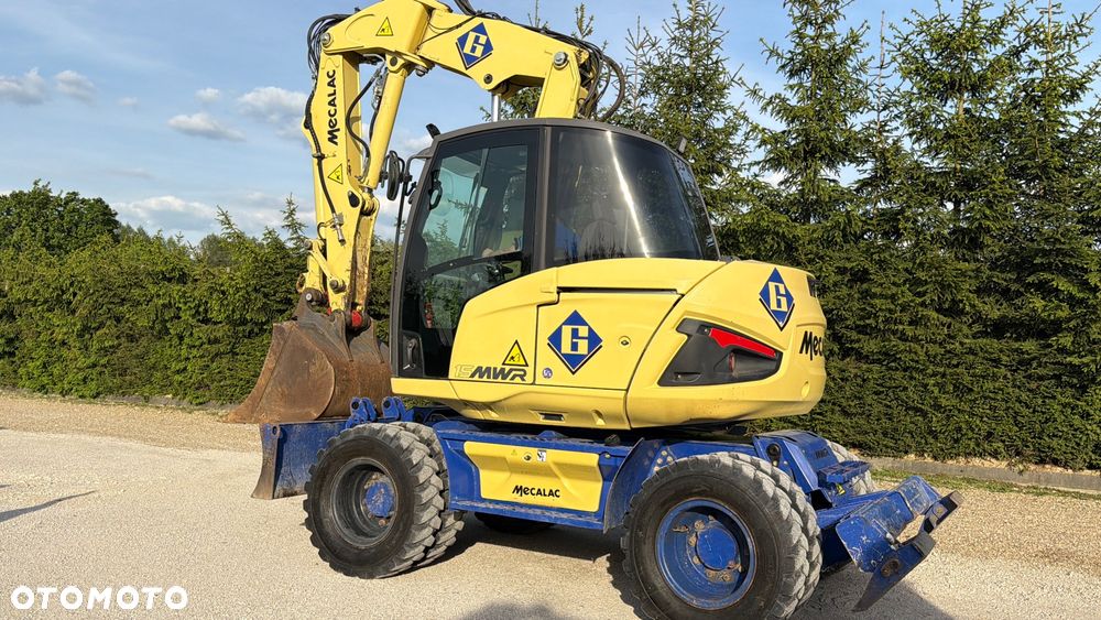 Mecalac Koparka 14 ton MECALAC 15 MWR koparko-ładowarka 3 łyżki widły 1 wł Centr.smarowanie Opony na BLIŹNIAKU 80%Camso ładowarka 714 12MTX 4x4 skrętne KLIMA kabina Premium silnik 146KM volvo EW140B DEUTZ szybka 35km/h - 17