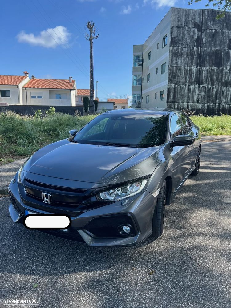 Honda Civic 1.0 i-VTEC Elegance - 1