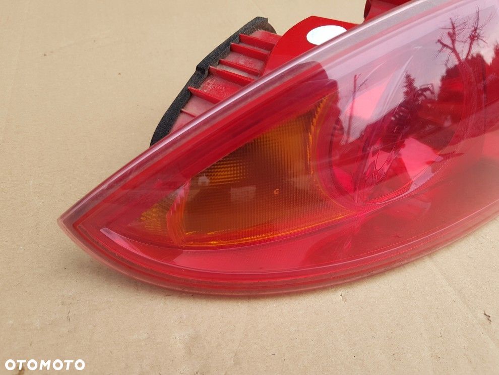 SEAT LEON II 05- LEWA TYLNA LAMPA ORYGINAŁ 1P0945111D STAN BDB - 3
