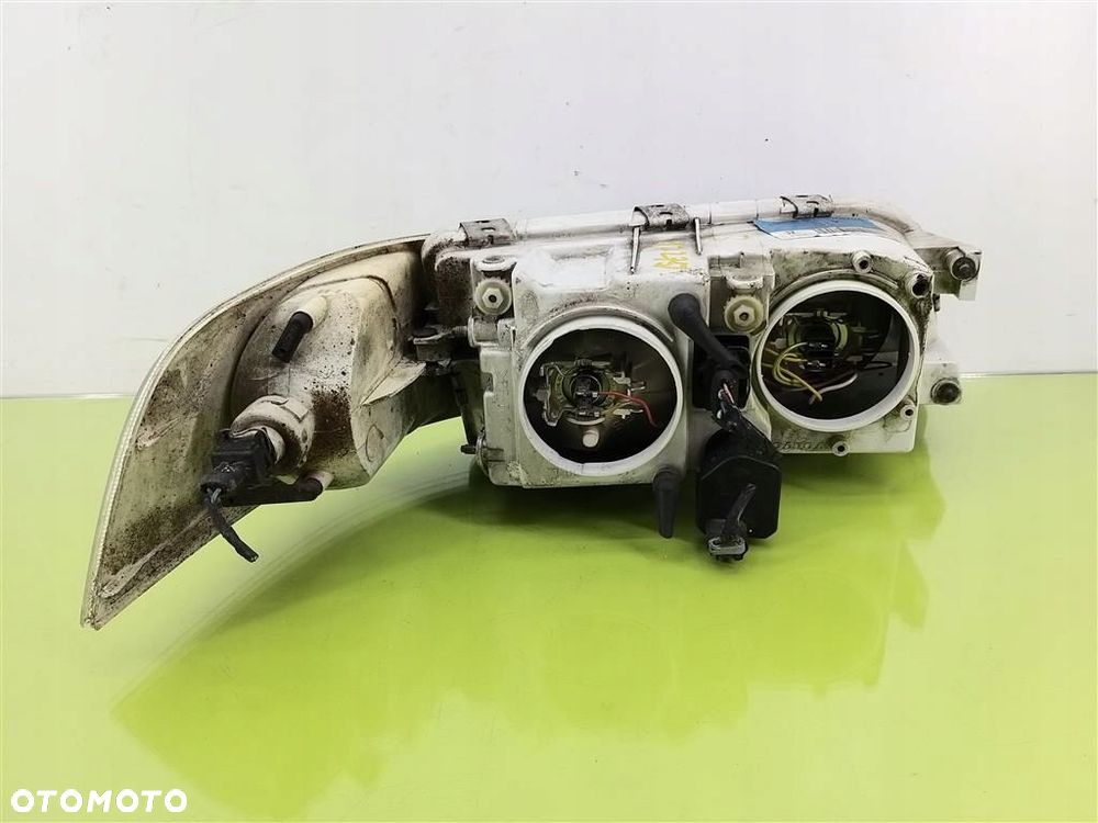Reflektor lampa przód lewa Volvo V40 1999-2004 R AG00786133 30899682 - 7
