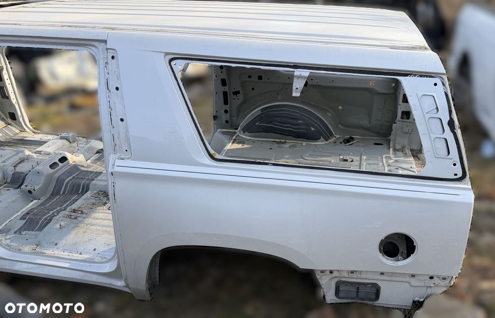 O3 CADILLAC ESCALADE IV 2014 - ESV ĆWIARTKA BŁOTNIK POSZYCIE LEWY TYŁ TYLNY - 1