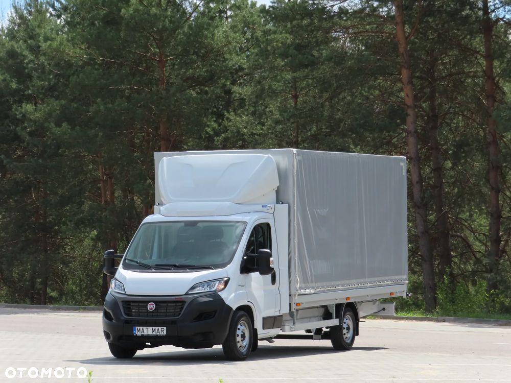Fiat Ducato seria 7 MAXI L4 2.3 MultiJet II 180 KM POWER FIRANA 10 E.Palet Skrzynia Plandeka 4916 mm Dł. WZMCNIANY Rozstaw Osi 4035 mm, DMC 3500 Kg, Ładowność 1180 Kg, FULL Opcja Wyposażenia, Android Auto/Carplay, Stan Wizualny I Techniczny NOWY Tak Jak Z Taśmy Produkcyjnej Gotowy Dostępny OKAZJA POLECAM - 1