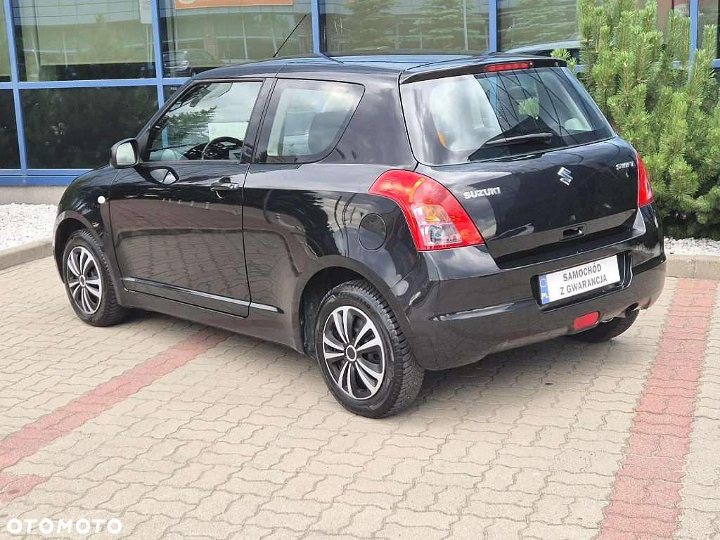 Suzuki Swift 1.3 Club - 12