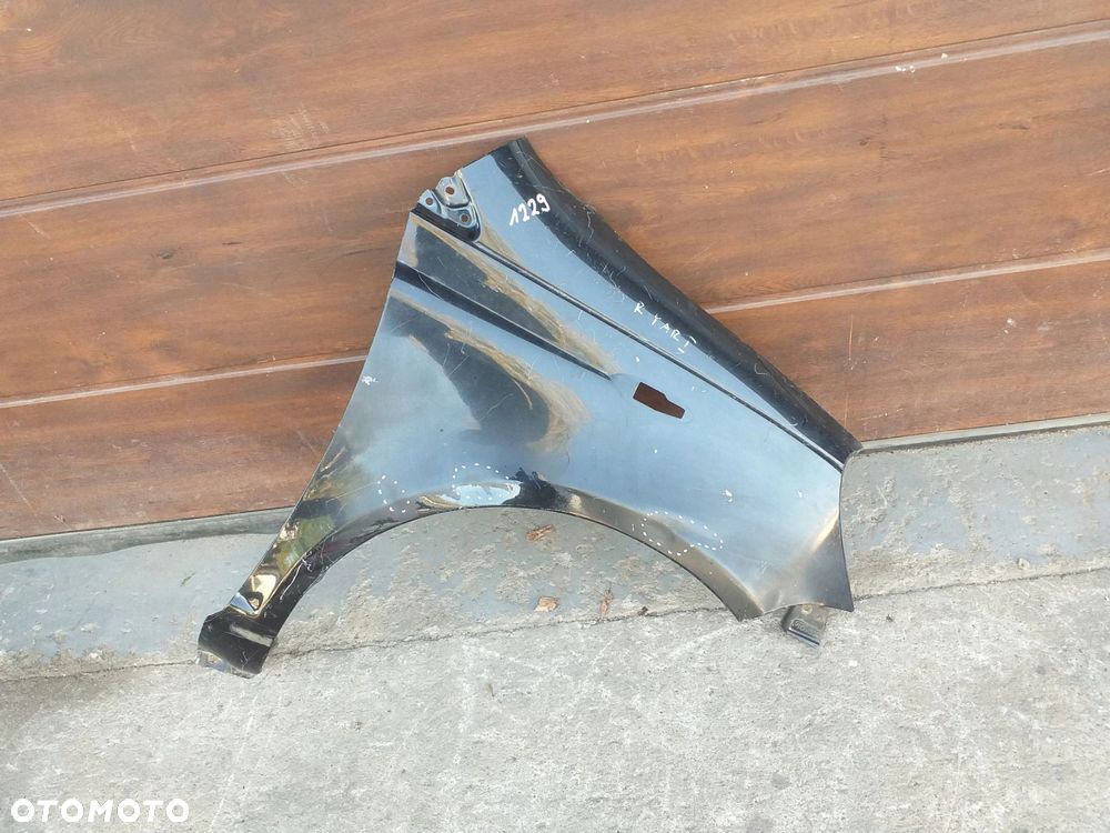 Toyota YARIS I błotnik przód prawy ORYGINAŁ