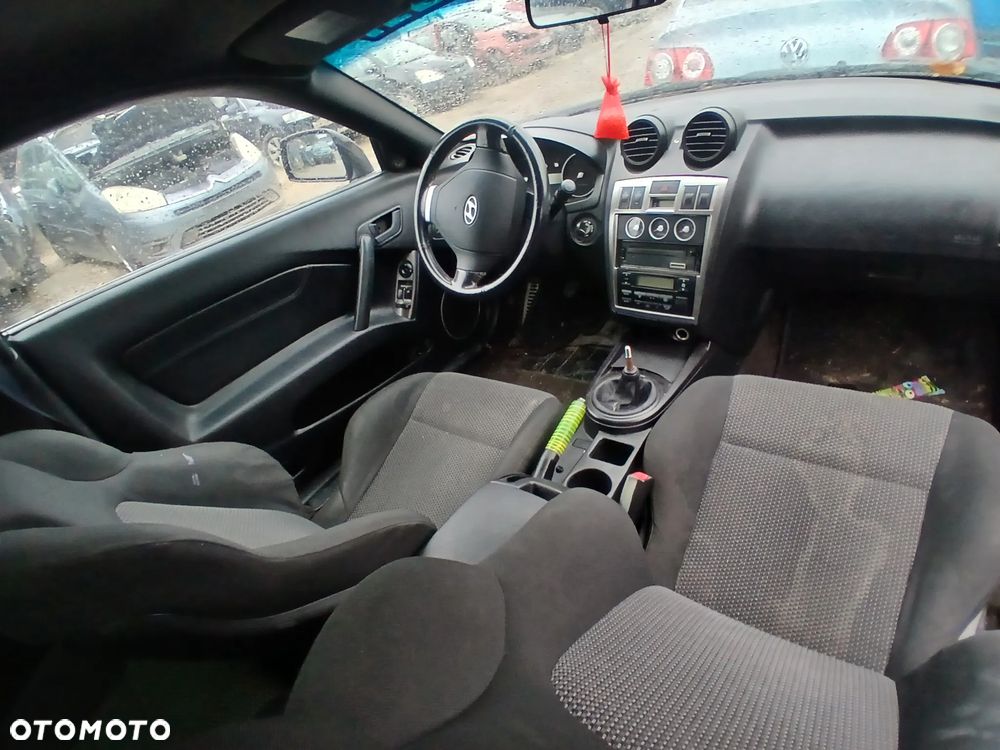 HYUNDAI COUPE TIBURON fotel fotele kanapa deska kokpit podsufitka boczek boczki klamka podłokietnik - 2