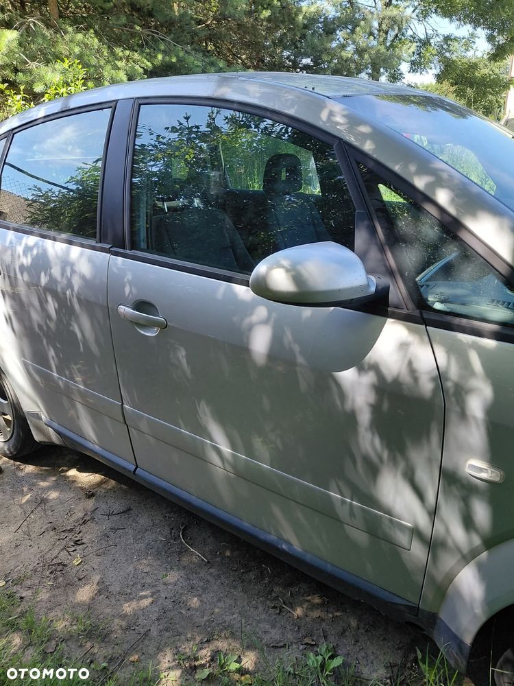 części AUDI A2 1.4TDI 55kW 2004r.5 drzwi hatchback LY7W DRZWI przód prawe lewe - 2
