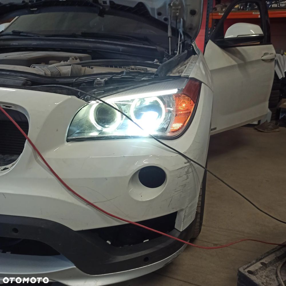 BMW X1 E84 LIFT 12-14r LAMPA LEWA BIXENON SKRĘTNY USA - 1