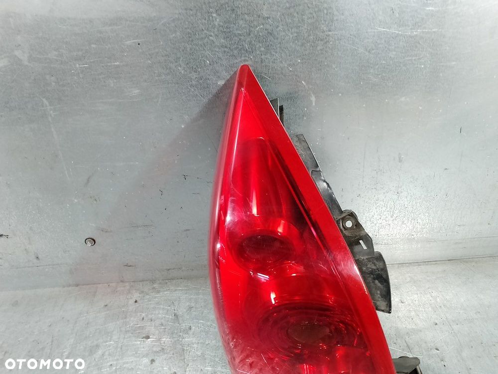 LAMPA TYLNA LEWA NISSAN PRIMERA P12 ( 03-07 ) 89077070 26555AU21B KOMBI - 5