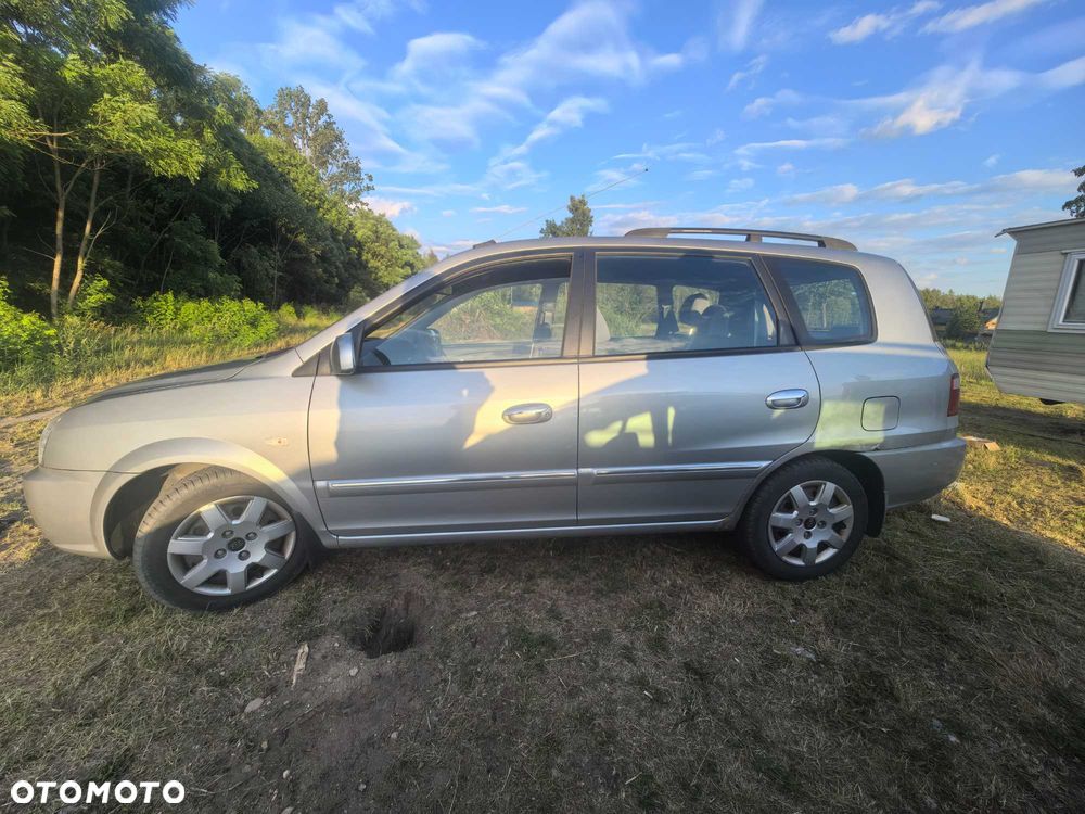 Kia Carens - 7