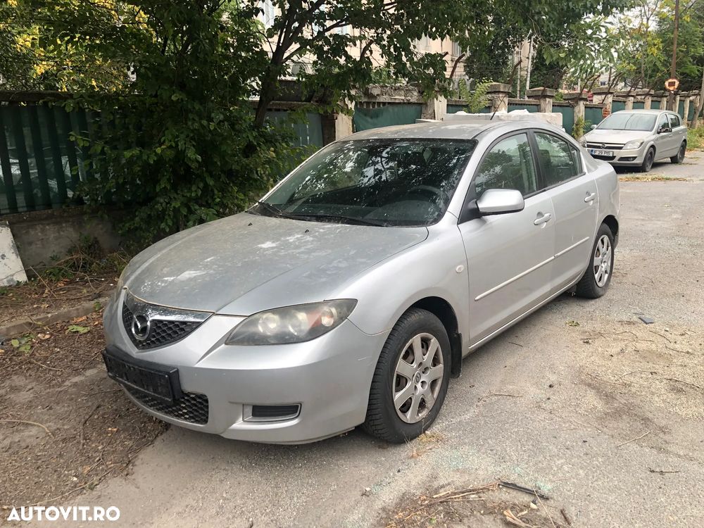 Dezmembrez Mazda 3 gri argintiu benzina 2008 - 1