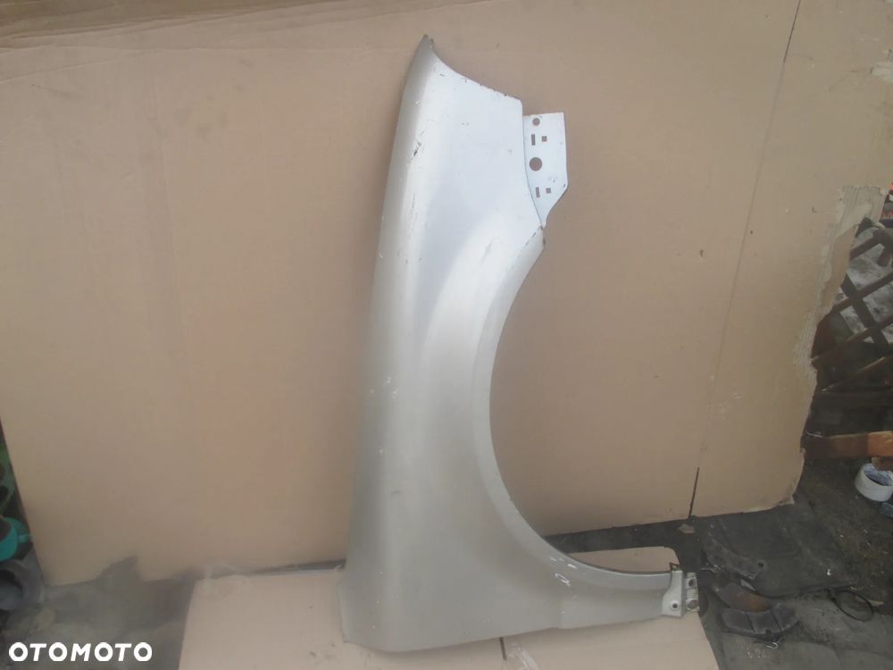 błotnik prawy VW Passat B5 FL Orginał bez rdzy - 1