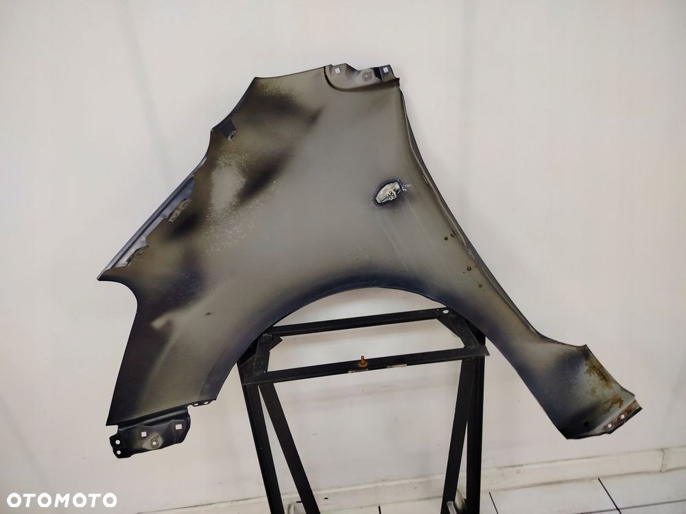 SUZUKI SPLASH 08R- BŁOTNIK PRAWY PRZÓD PRZEDNI ZCE - 10