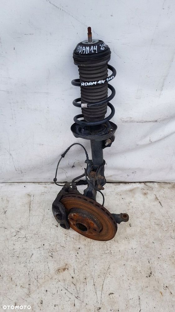 zwrotnica amortyzator lewa przód Opel Adam 1.4 - 1